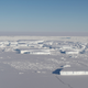 Tabular icebergs, with the massive A68 iceberg in the background.
